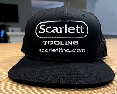 Scarletti Tooling scarlettinc.com on a hat